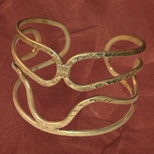 Gold Tone Bracelet with Minimalist Design and Hammered Texture